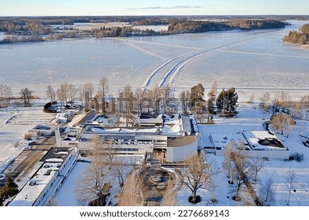 Early Spring aerial view of Gustavelund Hotel and Lake Tuusula. Icy lake and lake skating rink. Lake Tuusula, Tuusula - Finland