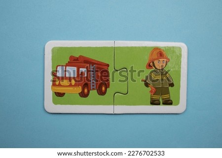 fire engine and fire truck picture puzzles, fire engine and fire truck picture puzzles shot from above, placed on blue background