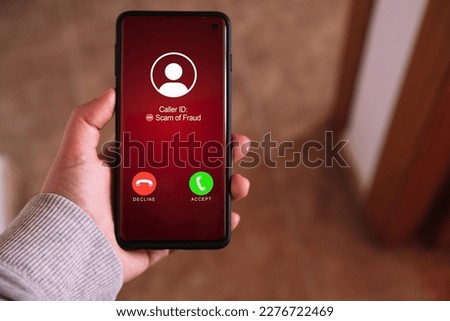 Smartphone incoming unwanted call. Spam, scam, phishing and fraud concept. Security technology. Royalty-Free Stock Photo #2276722469