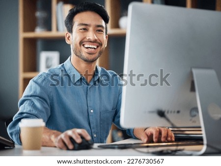 Computer, research and business man in office working online for information technology, internet or global digital company. Asian person or worker planning, reading or editing report on desktop pc
