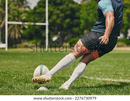 Rugby, sports man or kickball in game, practice workout or training match on stadium field outdoors. Fitness body, score goals or athlete player action playing in cardio exercise on grass in France Royalty-Free Stock Photo #2276730979