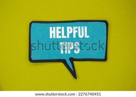 Helpful Tips concept photo. 'Helpful Tips' written on speech bubble. Royalty-Free Stock Photo #2276740451