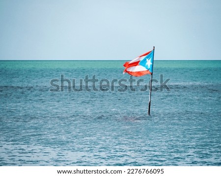 Puerto Rico flag in the middle of the ocean