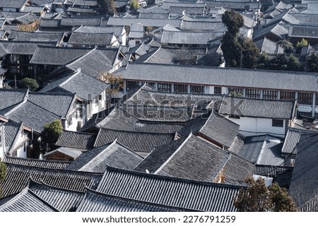 Retro style house eaves in ancient Chinese traditional style town Royalty-Free Stock Photo #2276791259