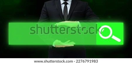 Businessman in office suit holding futuristic frame with glow in his hands. Digital design presenting brand new technologies. Text holder for main message.