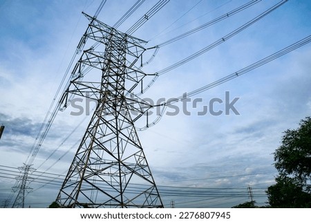 Electrical power lines and towers,electricity transmission on high voltage wiring cable,electric generator distribute to substation,line tower structure.