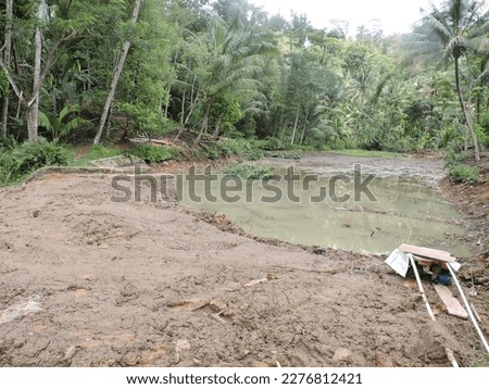natural pool full of mud, cleaned and foundationd