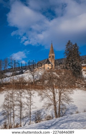 Small church in St. Magdalena or Santa Maddalena in Geislergruppe or Gruppo dele Odle Italian Dolomites Alps mountains. January 2023 Royalty-Free Stock Photo #2276846089