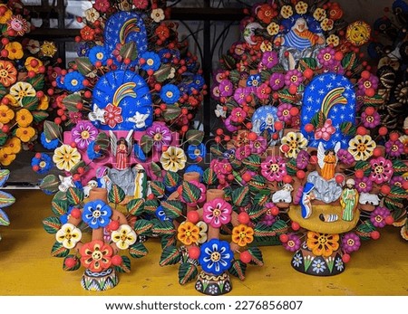 Hand made trees of life at market stall in mexico city Royalty-Free Stock Photo #2276856807