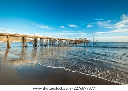 Malibu pier under a blue sky at sunset. California, USA Royalty-Free Stock Photo #2276899877
