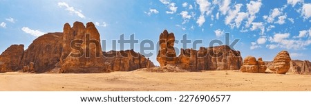 Rocky desert formations with sand in foreground, typical landscape of Al Ula, Saudi Arabia. High resolution panorama