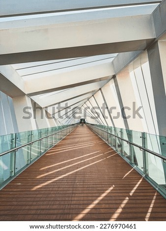 Dubai Water Canal Helix Bridge, pedestrian bridge with water taxi, in Dubai, UAE Royalty-Free Stock Photo #2276970461