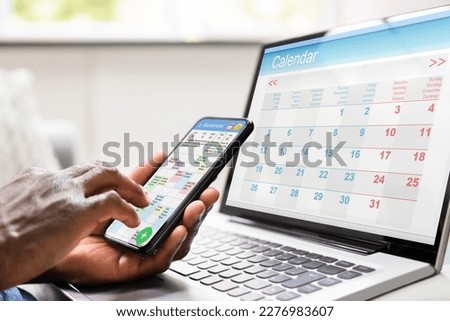 Appointment Schedule Planner And Date Calendar On Laptop And Phone