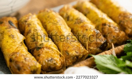 Vietnamese Fried Spring Rolls Stock Photo for Sale:

Capture the essence of Vietnamese cuisine with our stunning stock photo of fried spring rolls! This high-quality image features a beautifully arran