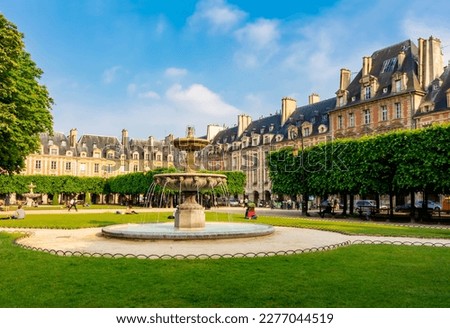 Fountain on Vosges square (Place des Vosges), Paris, France Royalty-Free Stock Photo #2277044519
