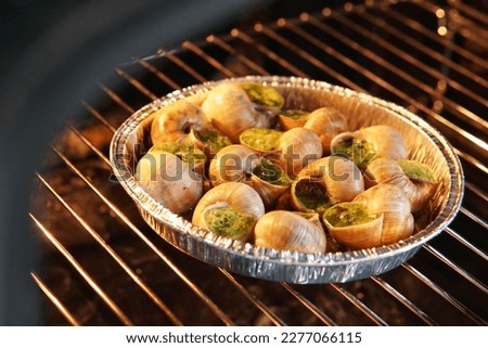 oven-baked burgundy snails with butter and herbs