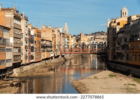 The historic city of Girona in Catalunya, Spain, boasts charming, winding streets and colorful, ancient buildings