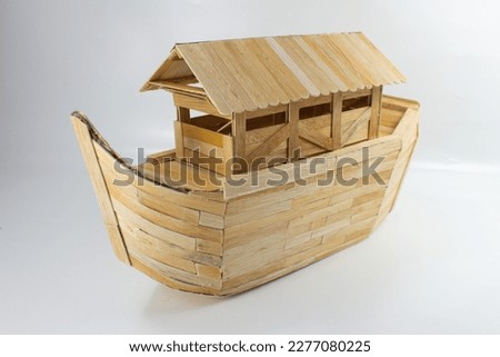 Handmade noah's ark from ice cream sticks isolated on white background Royalty-Free Stock Photo #2277080225