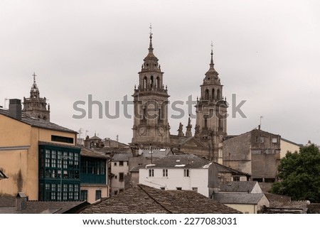 "Stunning view of the twin domes of the historic cathedral in Lugo, Spain."