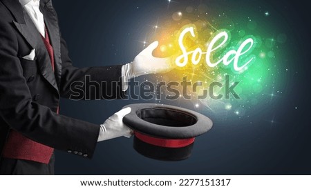 Young magician is showing magic trick