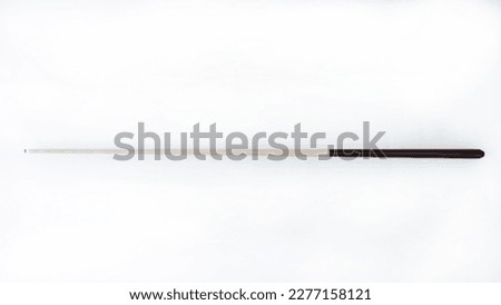 Billiard cues on a white background. Parts of a billiard cue close-up. Live photos of a billiard cue. Royalty-Free Stock Photo #2277158121