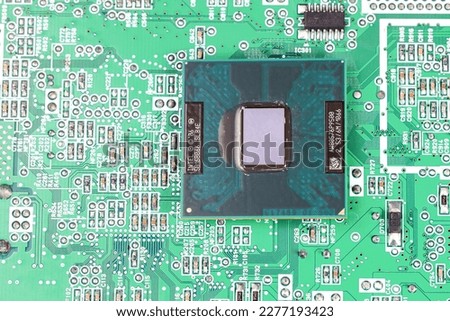 Close up of High performance CPU or central processor unit on electronic board background.
