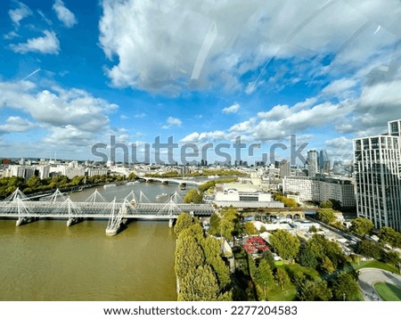 An areal view of London and bridges on the river Thames from the London Eye.