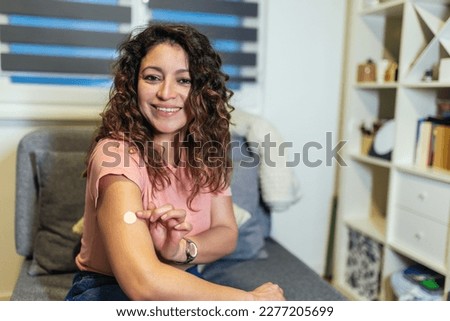 Woman at home using products for hormone replacement therapy. Royalty-Free Stock Photo #2277205699