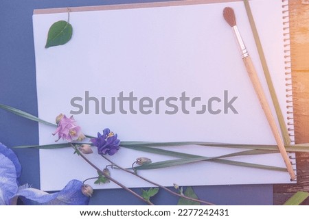 Floral background mockup with white empty space paper list, flowers and brush