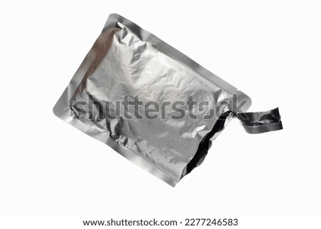 Open silver sachet, ripped disposable blank sachet packaging Royalty-Free Stock Photo #2277246583