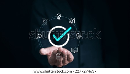Hand shows sign of top service quality assurance, Guarantee, Standards, ISO certification and standardization concept, satisfaction, service experience, Show the standards of products and services. Royalty-Free Stock Photo #2277274637