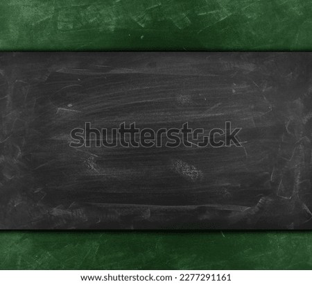 Chalk rubbed out on grey green chalkboard background