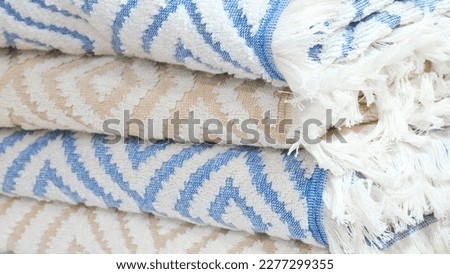 Colorful folded towels stack closeup picture, hotel service concept background