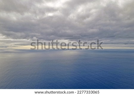 View of the ocean and overcast skies. The background of nature Royalty-Free Stock Photo #2277333065