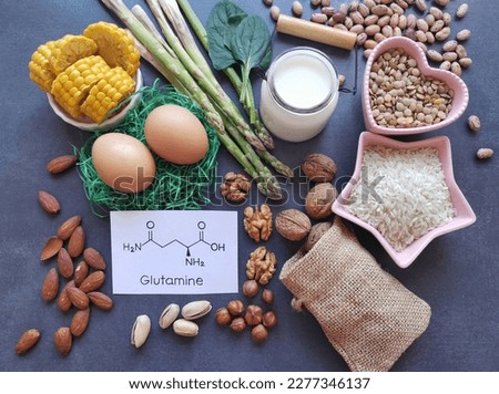 Foods rich in glutamine with structural chemical formula of glutamine. Glutamine is an amino acid with many function in the body. Natural source of glutamine. Healthy foods for training and exercise. Royalty-Free Stock Photo #2277346137