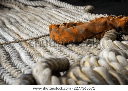 230317-N-EE352-1069 SAN DIEGO (March 17, 2023) Mooring lines are flaked down during a sea and anchor detail in preparation to get underway on the fantail of Nimitz-class aircraft carrier USS Carl Vins