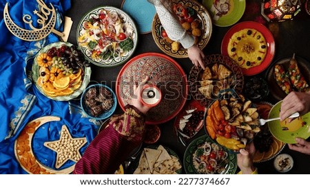 Eid holiday table. Ramadan family dinner. Breaking Fast, iftar. Arabic Middle Eastern traditional cuisine Royalty-Free Stock Photo #2277374667