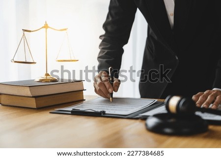 Female lawyer, legal consultant, asian businesswoman checking documents before signing venture capital business finance legal services concept in office. Royalty-Free Stock Photo #2277384685