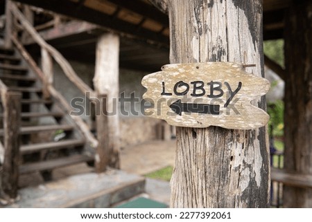 Wooden sign with message LOBBY,lobby sign board
