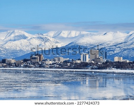 Snow town Anchorage, Alaska, the United States of America is one of many people's dream to visit due to its scenery, culture, culinary. Royalty-Free Stock Photo #2277424373
