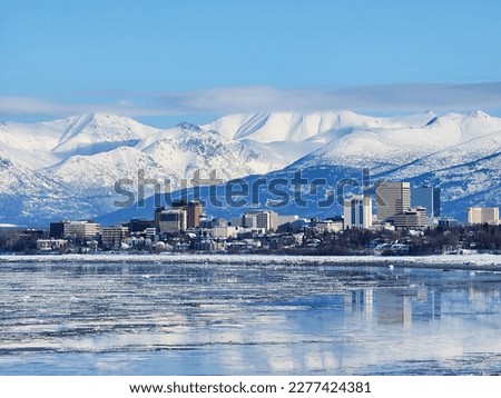 Snow town Anchorage, Alaska, the United States of America is one of many people's dream to visit due to its scenery, culture, culinary. Royalty-Free Stock Photo #2277424381