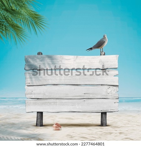 Old wooden sign and funny seagull on the beach, summer vacations concept Royalty-Free Stock Photo #2277464801