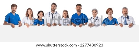 Group of doctors holding empty banner. Isolated on white background, copy space for text content