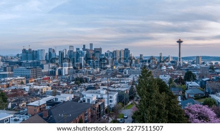 Seattle, Washington skyline and Mount Rainier at dusk