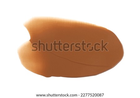 Brown paint sample on white background, top view