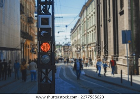 Red traffic light for tram.