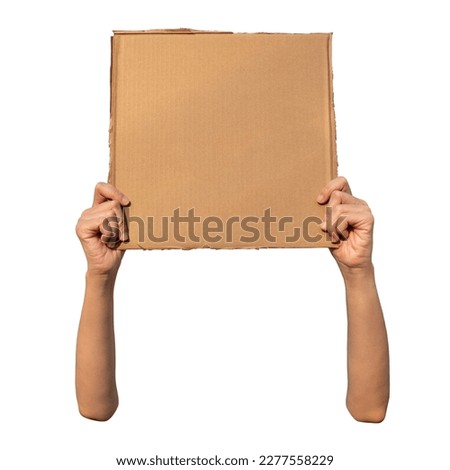 Hands holding cardboard isolated on white background with clipping path. Demonstration concept.