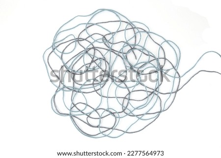 Tangled colorful cotton threads isolated on white background. Abstract thread lines chaos pattern. Royalty-Free Stock Photo #2277564973