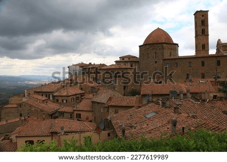 Medieval Italian city of Volterra before a summer thunderstorm.