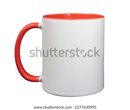 White ceramic cylindrical mug cup with red handle close-up isolated on a white background clean for layout and design, inscriptions and pictures